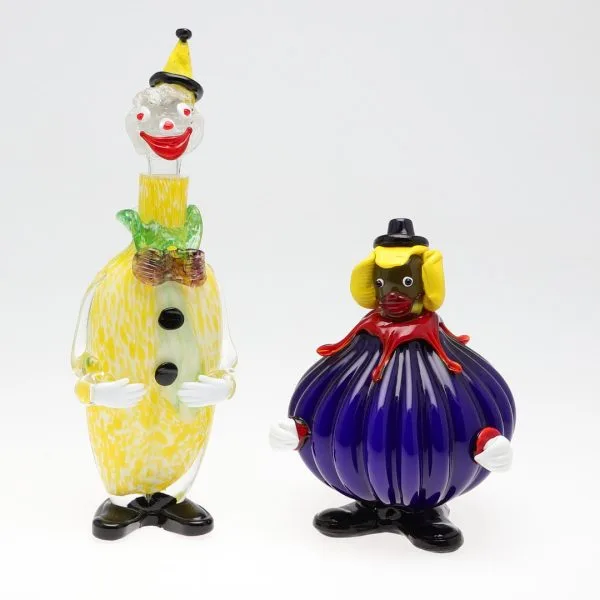 Murano glass clown models with eerie faces - one is a decanter